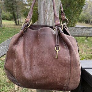 Fossil leather shoulder bag. Tear in liner